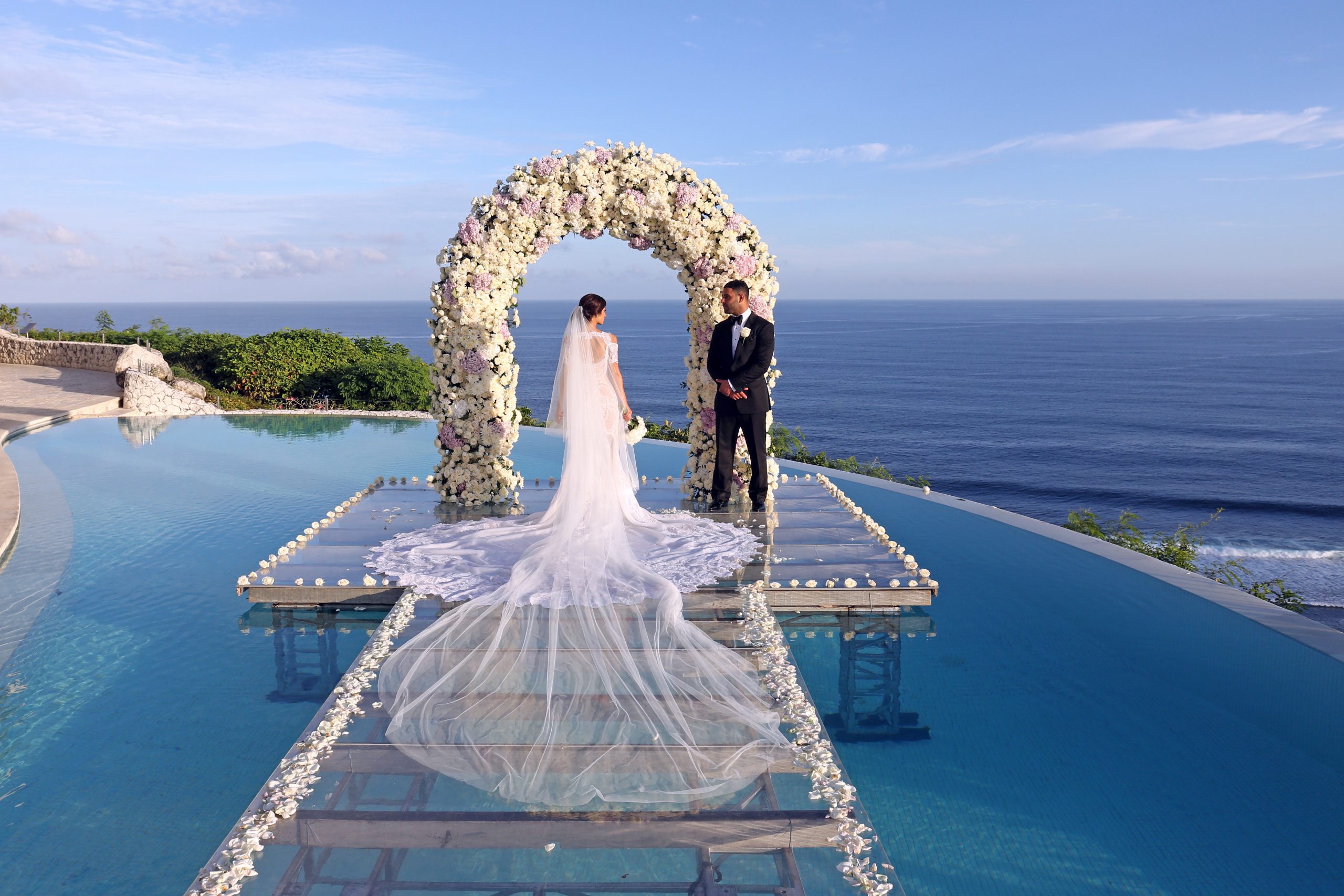poolside-ceremony-karma-kandara-bali source: ww.baliweddingsolutions.com